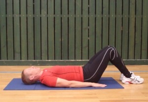 Exercice de gainage couché sur le dos position de départ